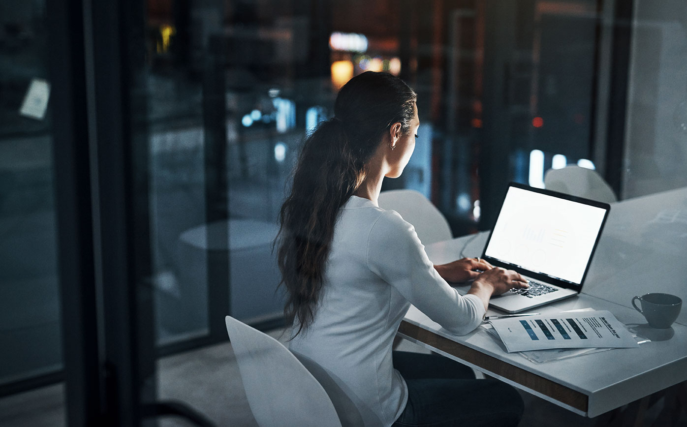 Female working from home at night