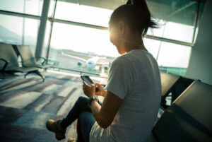 Female traveller waiting in lounge at airport